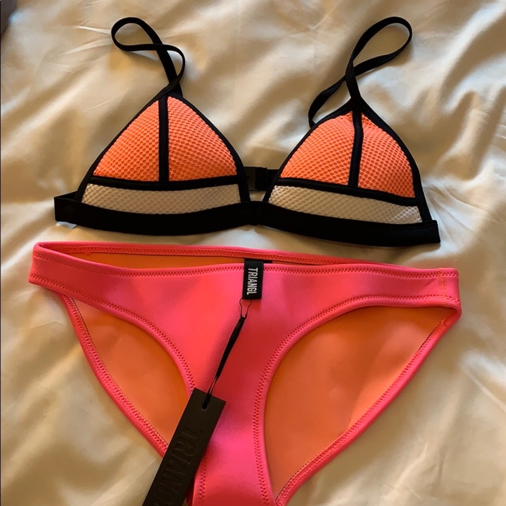 Never been worn size Medium Triangl swim suit!